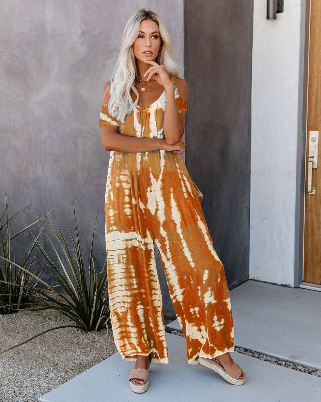 WOLFF | Bedruckter lässiger Jumpsuit mit kurzen Ärmeln und Taschen