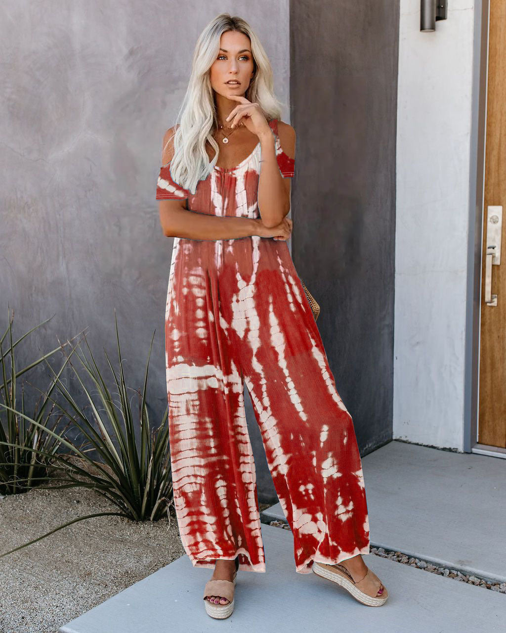 WOLFF | Bedruckter lässiger Jumpsuit mit kurzen Ärmeln und Taschen