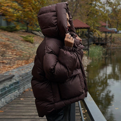 Damen gesteppte Winterjacke mit oversized Kapuze Heidi-Mode